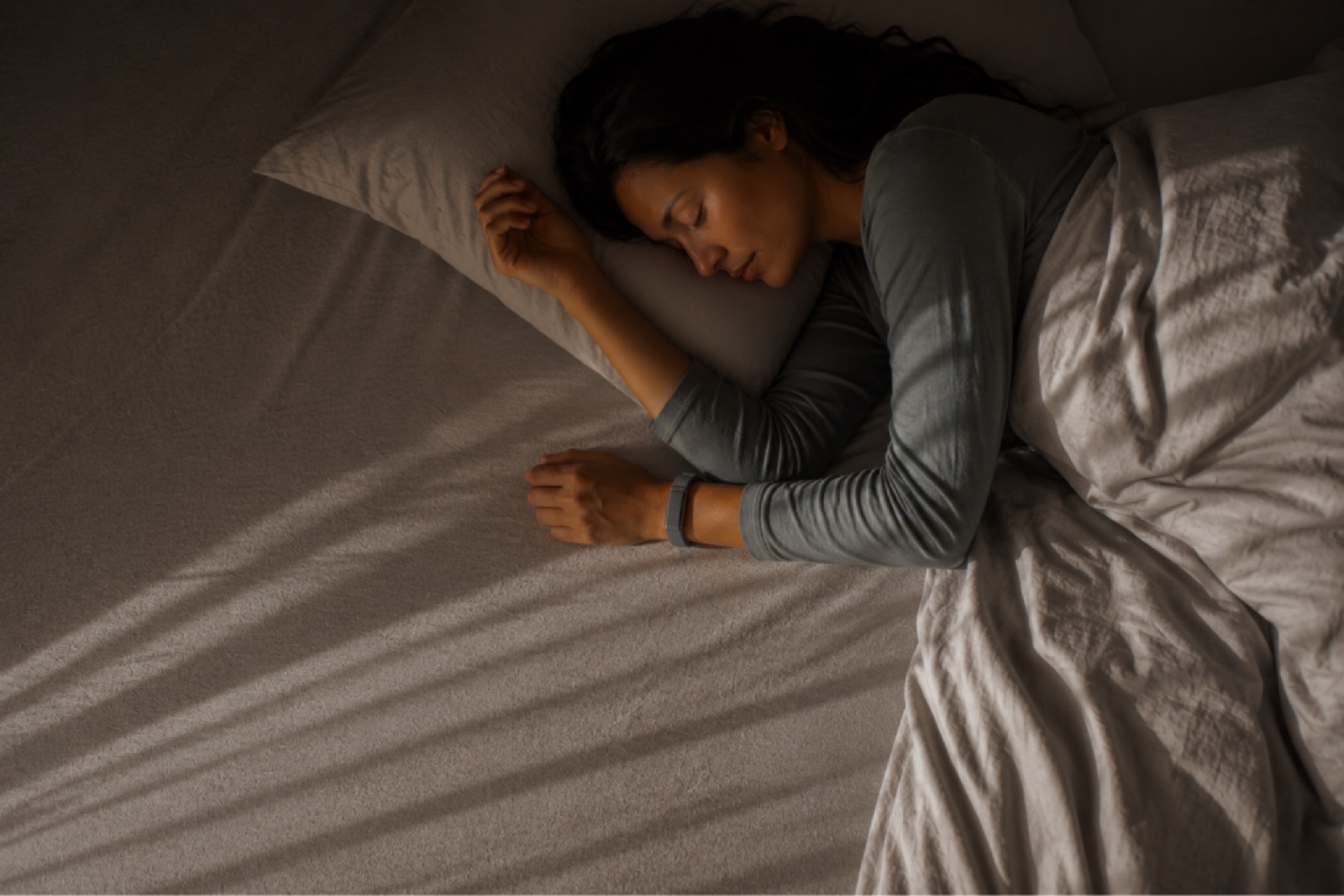 Person sleeping while wearing a health band
